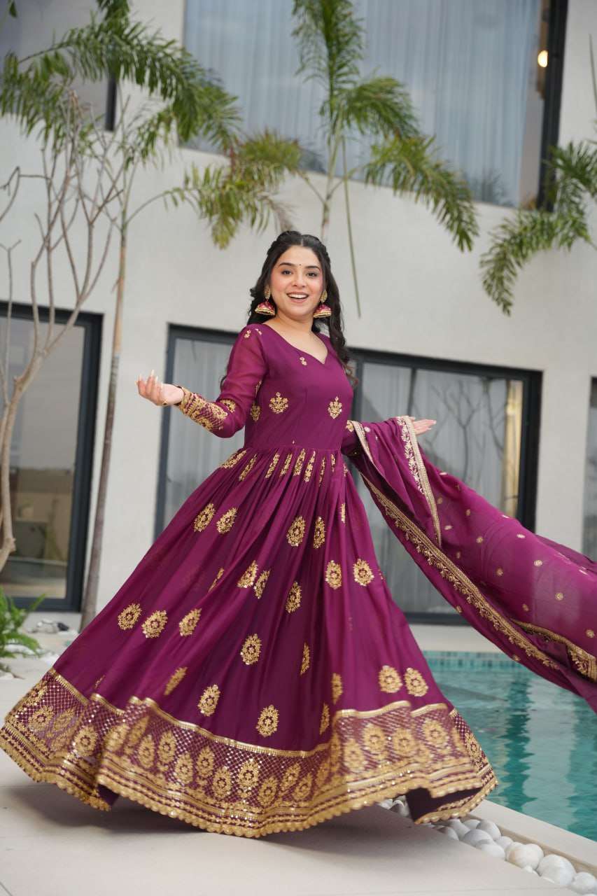 Womenβs Ethnic Anarkali Style Floor-Length Gown in Magenta with Golden Zari Embroidery β Festive & Wedding Wear
